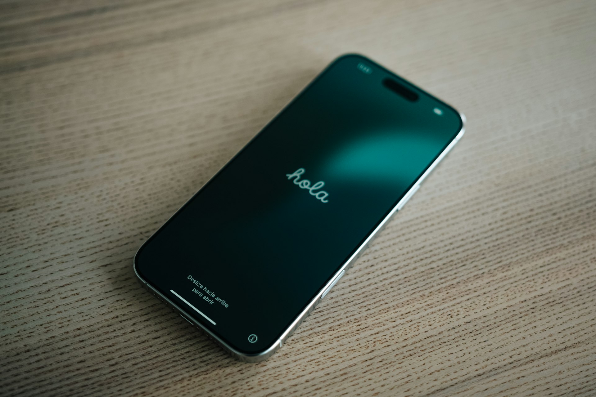 A close up of a cell phone on a table